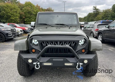 2015 Jeep Wrangler Unlimited из США, поврежденный, VIN 1C4BJWEG2FL770349